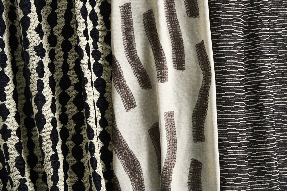 Curtains 17 Three Isara curtain fabric swatches in monochrome dot, brushstroke and stripe patterns - Melksham Blinds